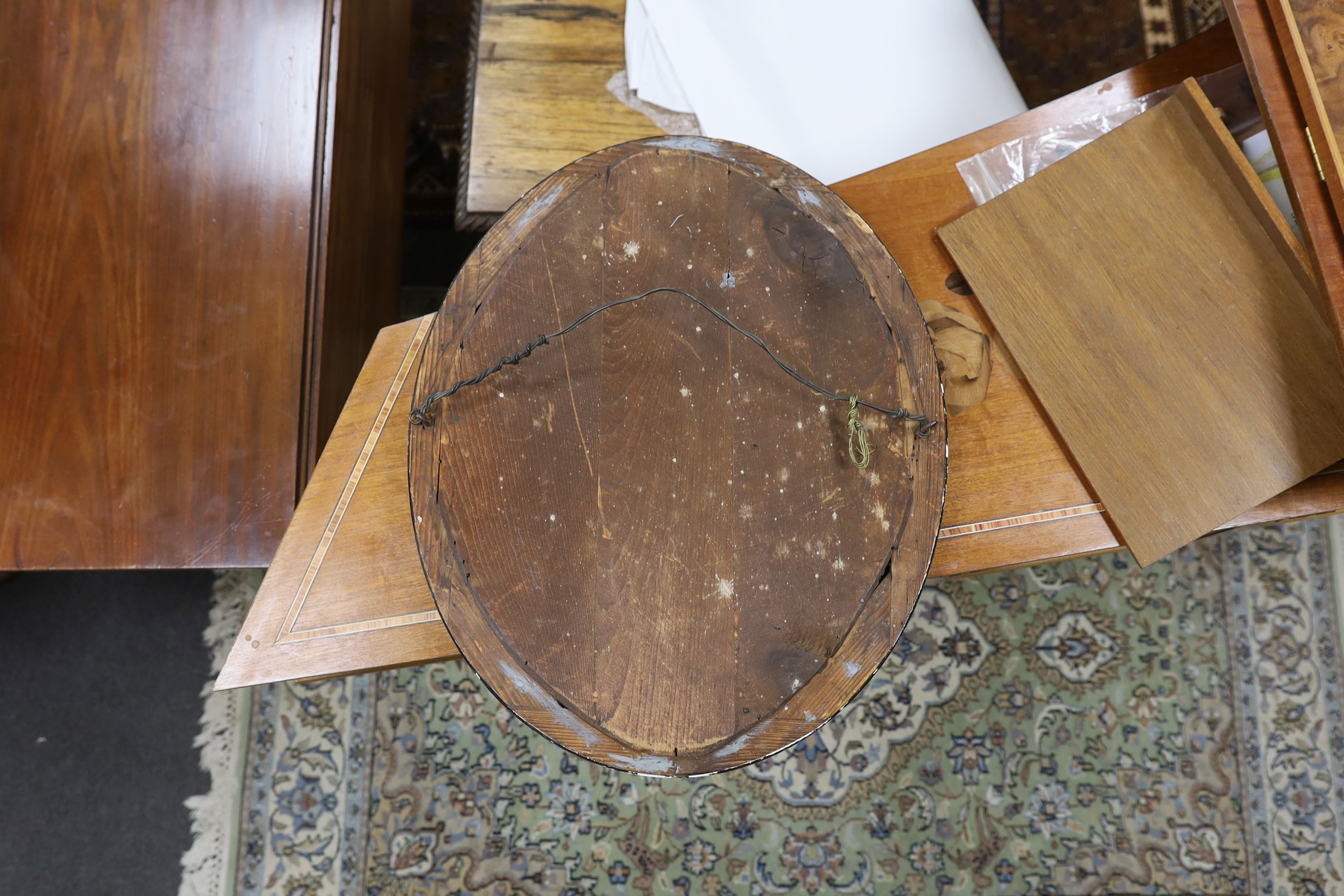 A small 19th century Irish oval wall mirror, with twin faceted and cabochon glass border, width 46cm, height 56cm